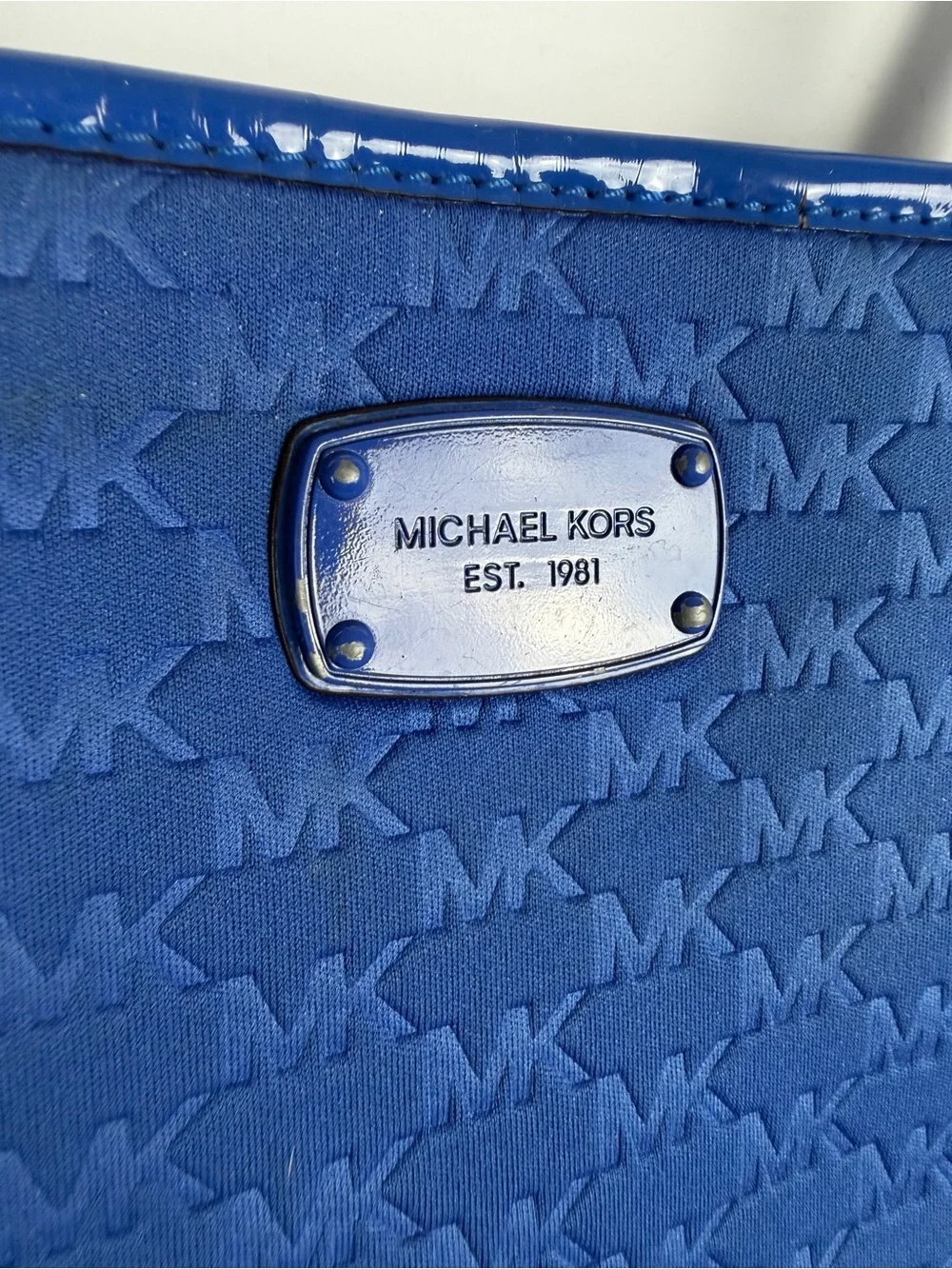 Michael Kors embossed MK monogram tote bag with matching double shoulder straps